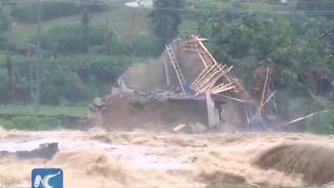 RAW: entire building swept away by raging floods