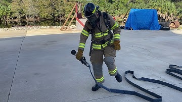 Climb a ladder with an uncharged hose line