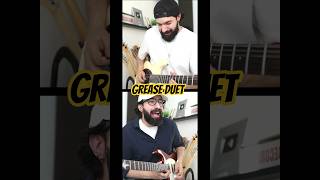 Guitar Duet: John Travolta + Olivia Newton-John