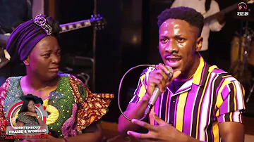 OKOPI PETERSON WITH ADEYINKA ALASEYORI IN WORSHIP