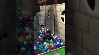 Jumping in pile of balls