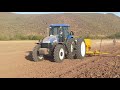 TS6.125 NEW HOLLAND CABINA FWD DOBLE RODADO MARCANDO 6 SURCOS