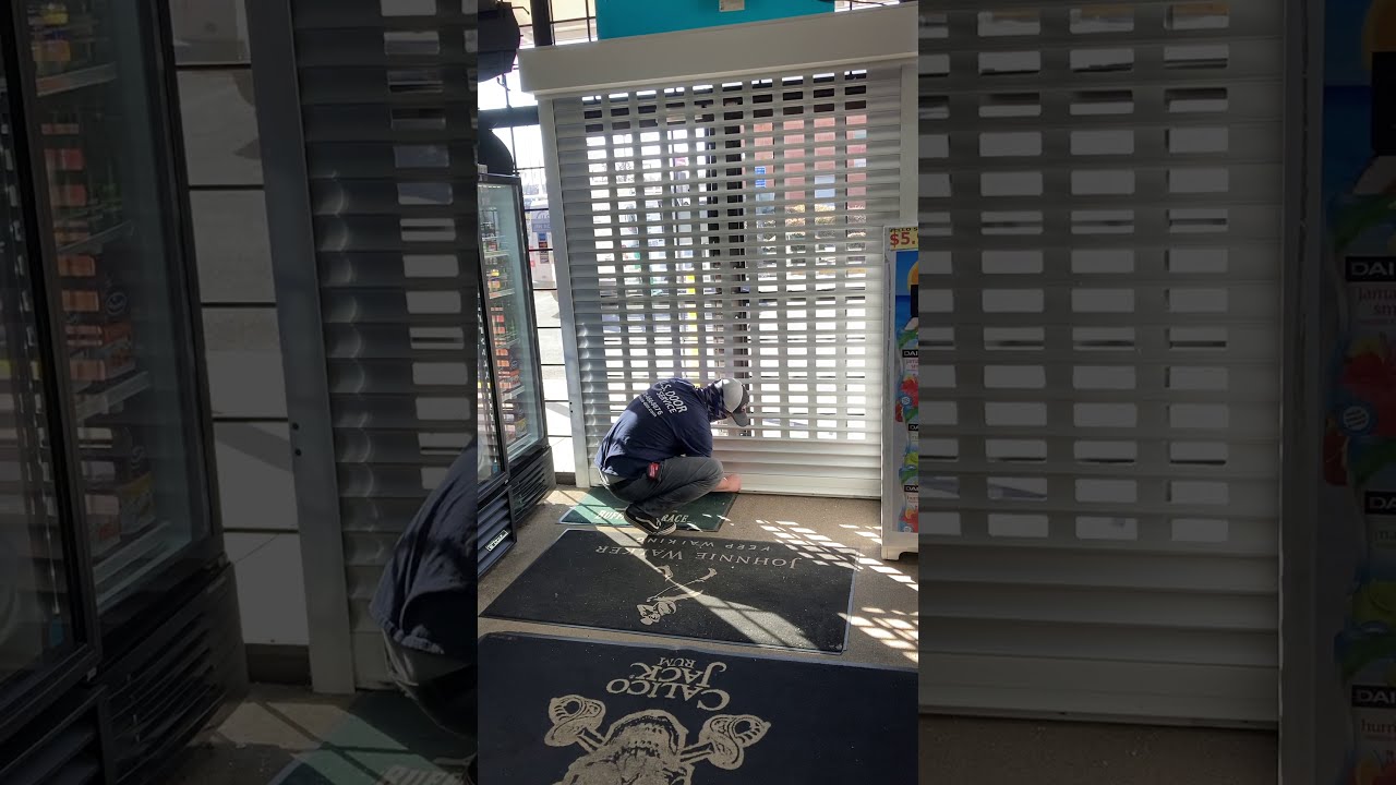 Security Shutter Installed on inside of storefront by US Door Service.