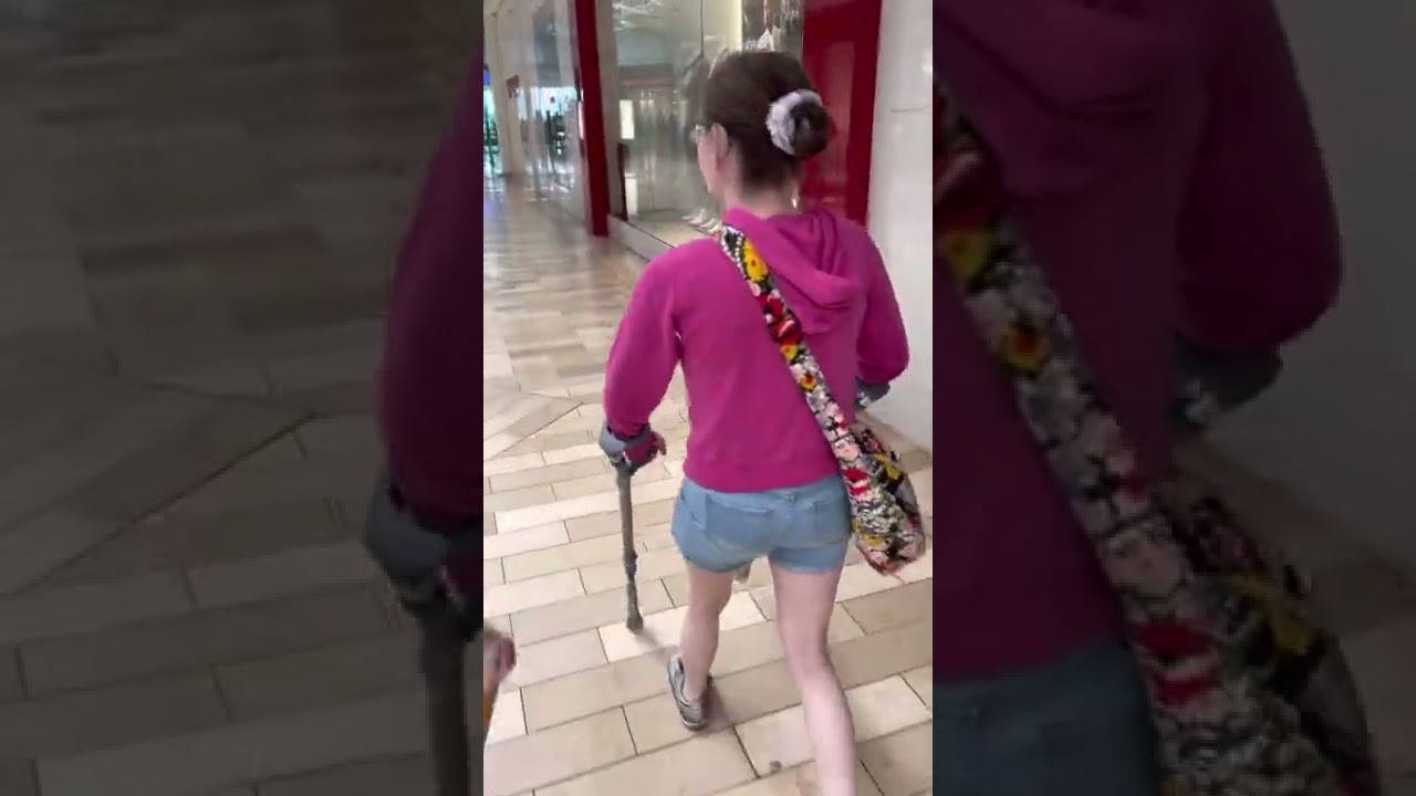Blind girl with dwarfism Walking The mall￼ with crutches!￼