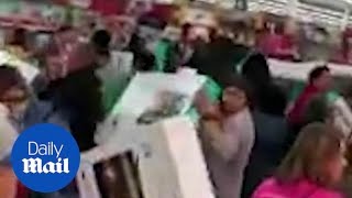 Chaos as US shoppers descend on stores for Black Friday deals