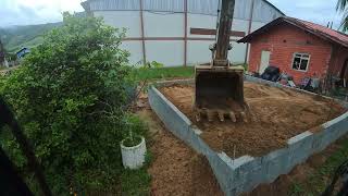 fazendo limpeza e aterrando fundação