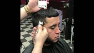 Men's Hair design with a bold taper fade
