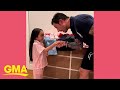Father helps daughter plan her outfits for school