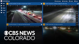 Snowy and icy conditions hamper travel in the high country along Colorado's I-70
