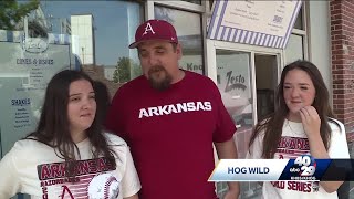 Watch: Razorback dad shares love for hogs with twin daughters