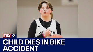 Child dies after falling off bike Content