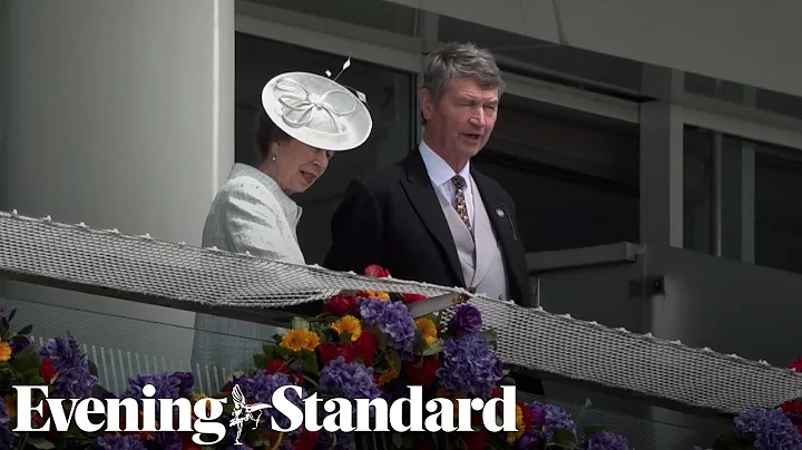 Anne grinning from ear to ear as she attends Epsom...