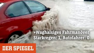 Waghalsiges Fahrmanöver: Starkregen: 1, Autofahrer: 0 | DER SPIEGEL