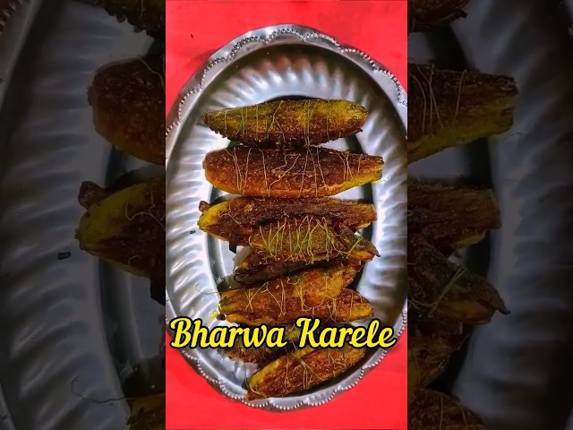 मसालेदार चटपटे Bharwa Karele Recipe / Stuffed Karele class=