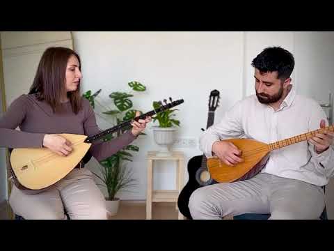 Tolga Hocamız ve bağlama öğrencimiz Ülkü Hanım
