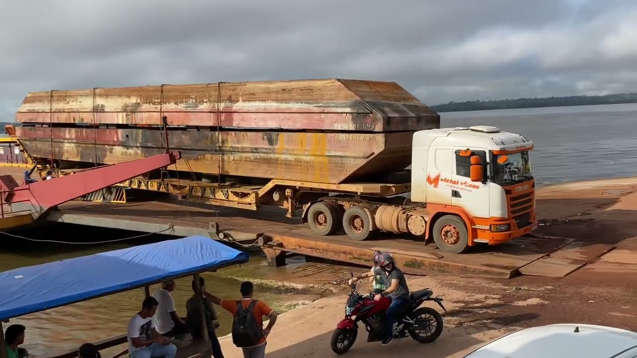 Nesse vídeo foi a caminhão prancha que carregou a balsa