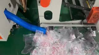 Double channel continuous roll vest bag making machine