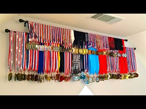 Vídeo: Com Guardar Medalles