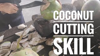 fresh coconut saller cut coconut, in Kudat Sabah Malaysia. simple and easy.