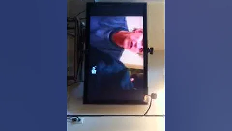 Gary Busey aiding Jeff Conaway