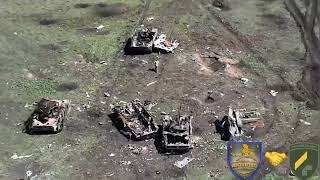 Ukraine FPV drone works on Russian soldiers who tried to hide tanks, BMP, and APC