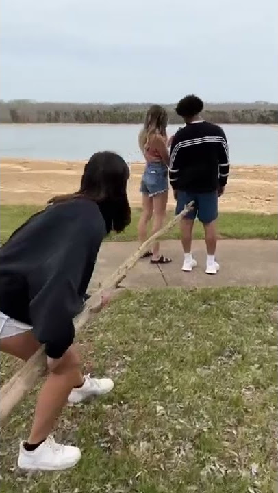 She jabbed him in the butt with a giant stick!