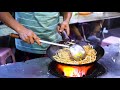 Chinese Street Food -Fried rice with eggs .Fried Pork in Scoop，the egg fills the cake