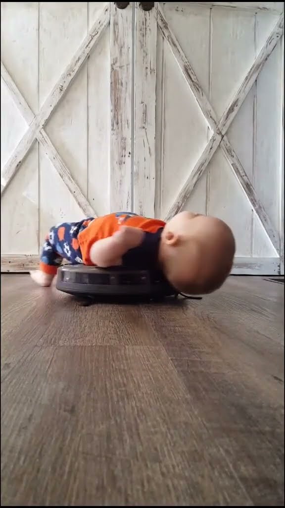 Son Relaxes On Robot Vacuum || ViralHog