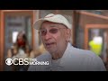 91-year-old salmon slicer Len Berk heads back behind the counter after COVID left him furloughed