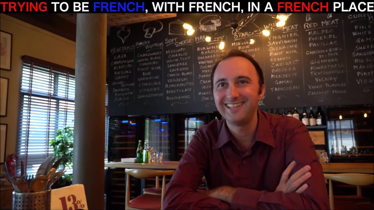 Emjay with The Smiling Afro at French restaurant