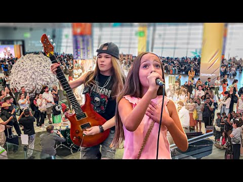 Amazing 9 Years Old Perform OVER THE RAINBOW At The Airport 