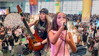 Amazing 9 years old perform OVER THE RAINBOW at the airport!