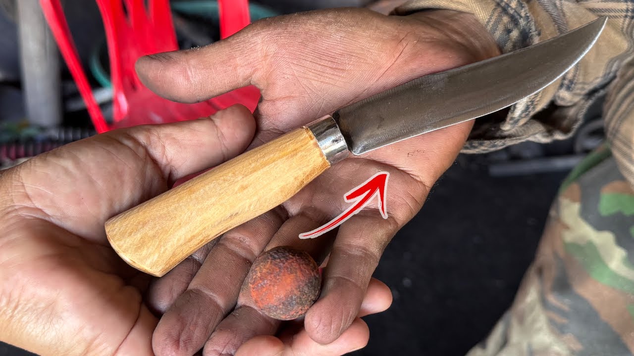 This is a wonderful work of art turning a bearing ball into a nice knife