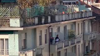 Opera Singer Performs on the Balcony of her House - 1108802
