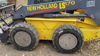 New Holland Skid Steer  Stainless Steel Wheel Mud Caps