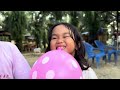 The fun of blowing balloons with little brothers and sisters outdoors