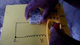 How to check a refrigerator's defrost timer.