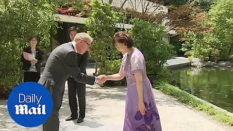 World leaders' wives and Philip May arrive for G20...
