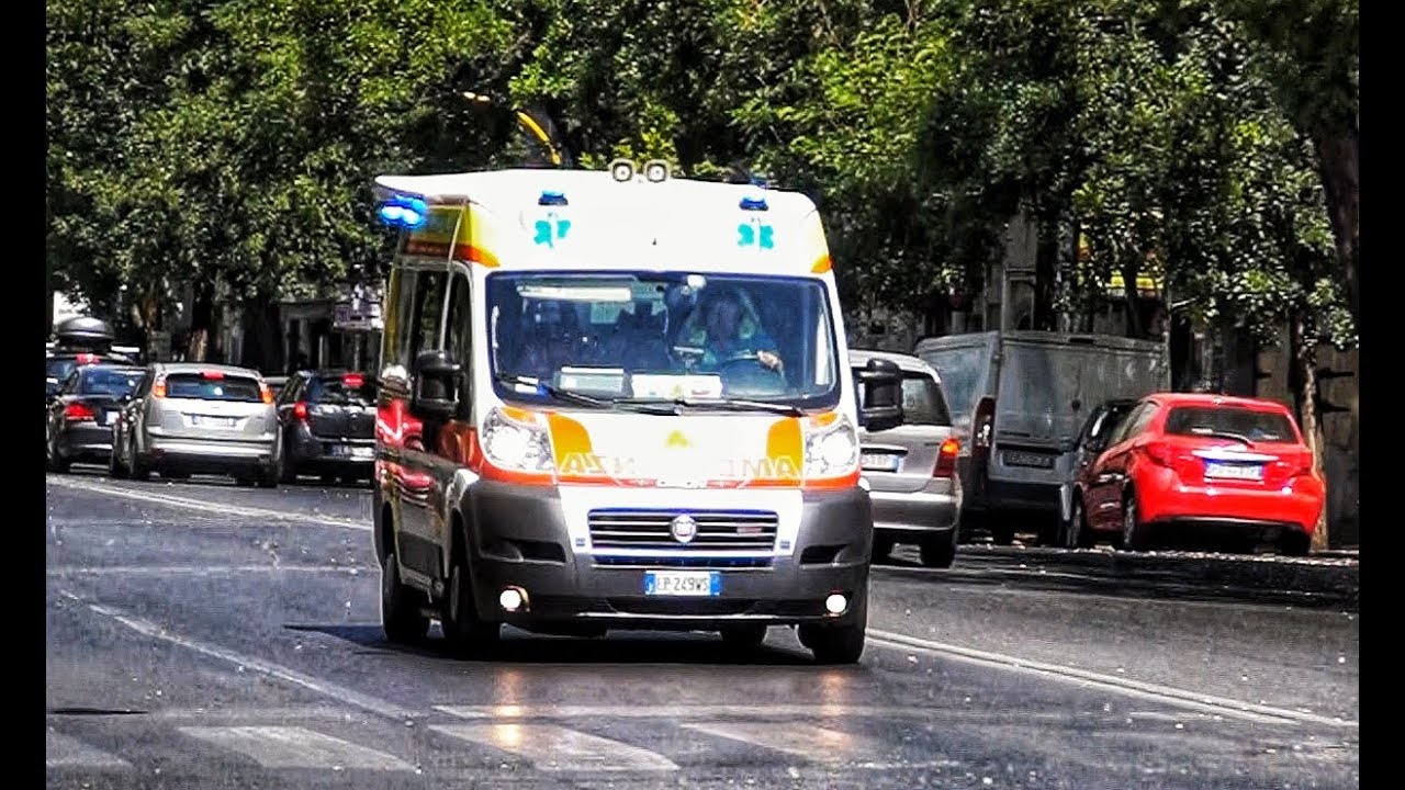 Italian Ambulance responding code 3 to the hospital in Rome in