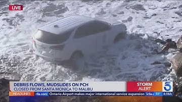 Fire department SUV swept into ocean by raging mudslide