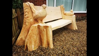 Chainsaw carving a Wildlife Bench from Western Red Cedar