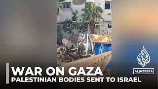 War on Gaza: Video emerges of Israeli soldiers seizing Palestinian bodies from alShifa Hospital