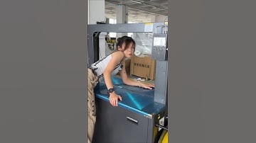 9mm fully automatic thin strapping machine for carton factory saves consumables and is operated.