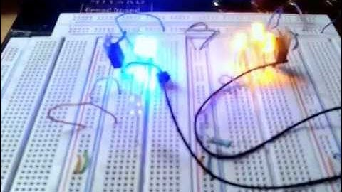 Blinking LED lights to music with TIP31 transistor on a breadboard