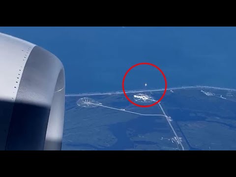SPACEX FALCON 9 ROCKET FLIES PASS A PASSENGER JET OVER ITS LAUNCHPAD