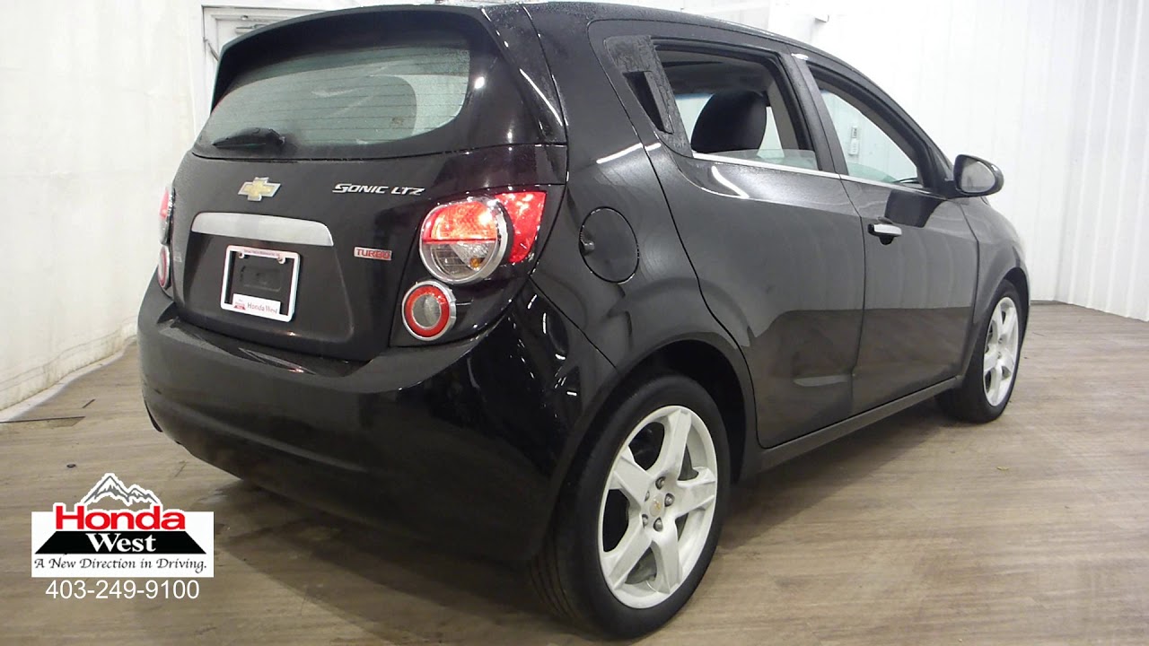 Chevrolet Sonic Repair Manual: Rear License Plate Lamp Bulb Replacement (Hatchback) Chevrolet Sonic Repair Manual: Rear License Plate Lamp Bulb Replacement (Hatchback)