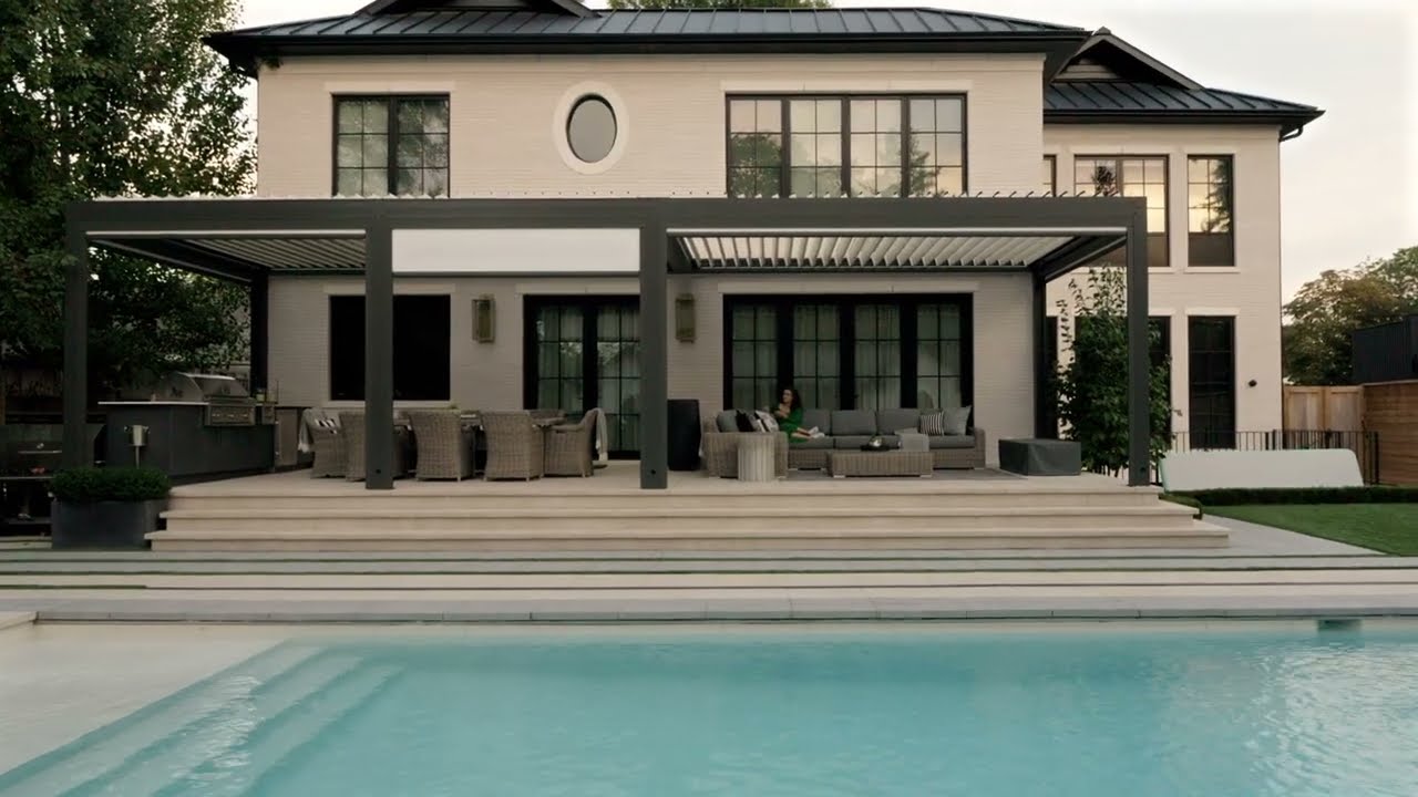14' by 40' Modern Aluminum Pergola attached to the house with zip screens around