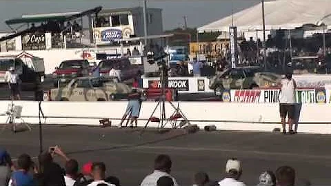 Chuck Spiker drives the Army Mustang against Keith...