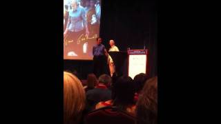 Dr. Jane Goodall demonstrates two types of chimp greetings