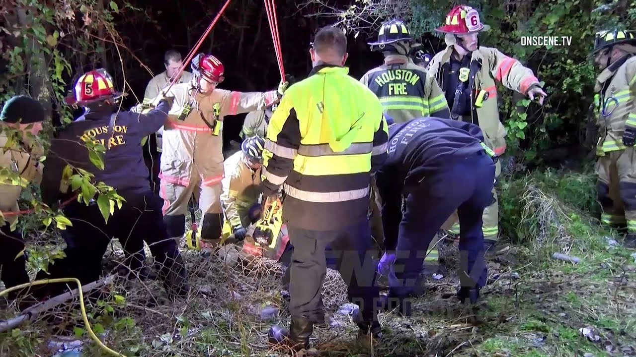 Man Rescued After Falling Into Uncovered Manhole In Houston - YouTube